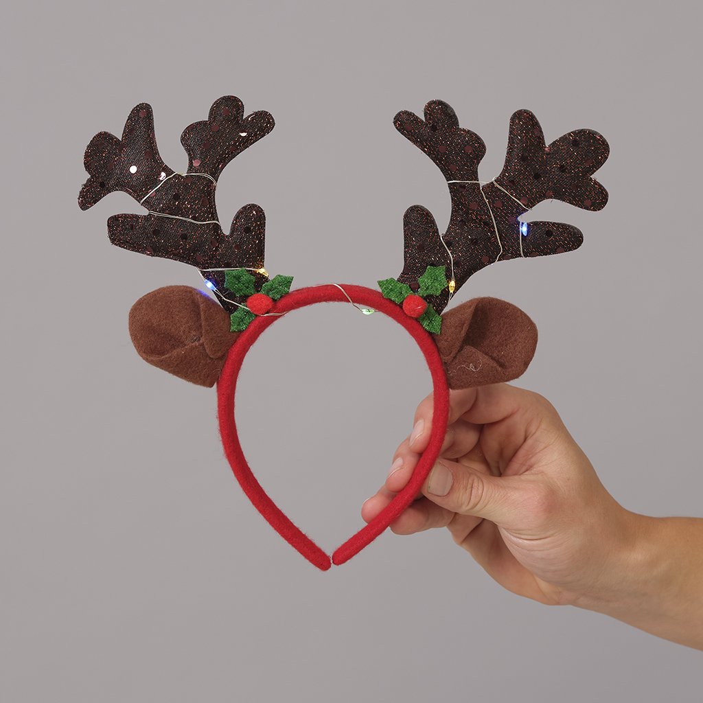 En röd och brun hårinpackning som liknar renhorn.