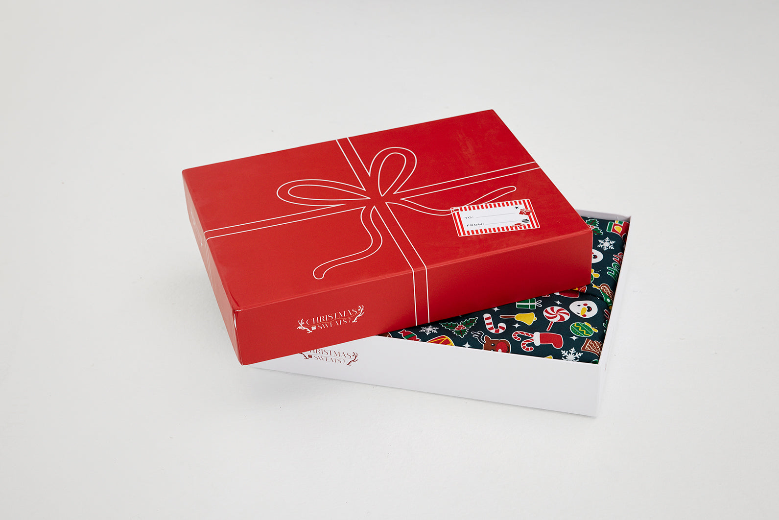 En fin röd julklapp som har öppnats.