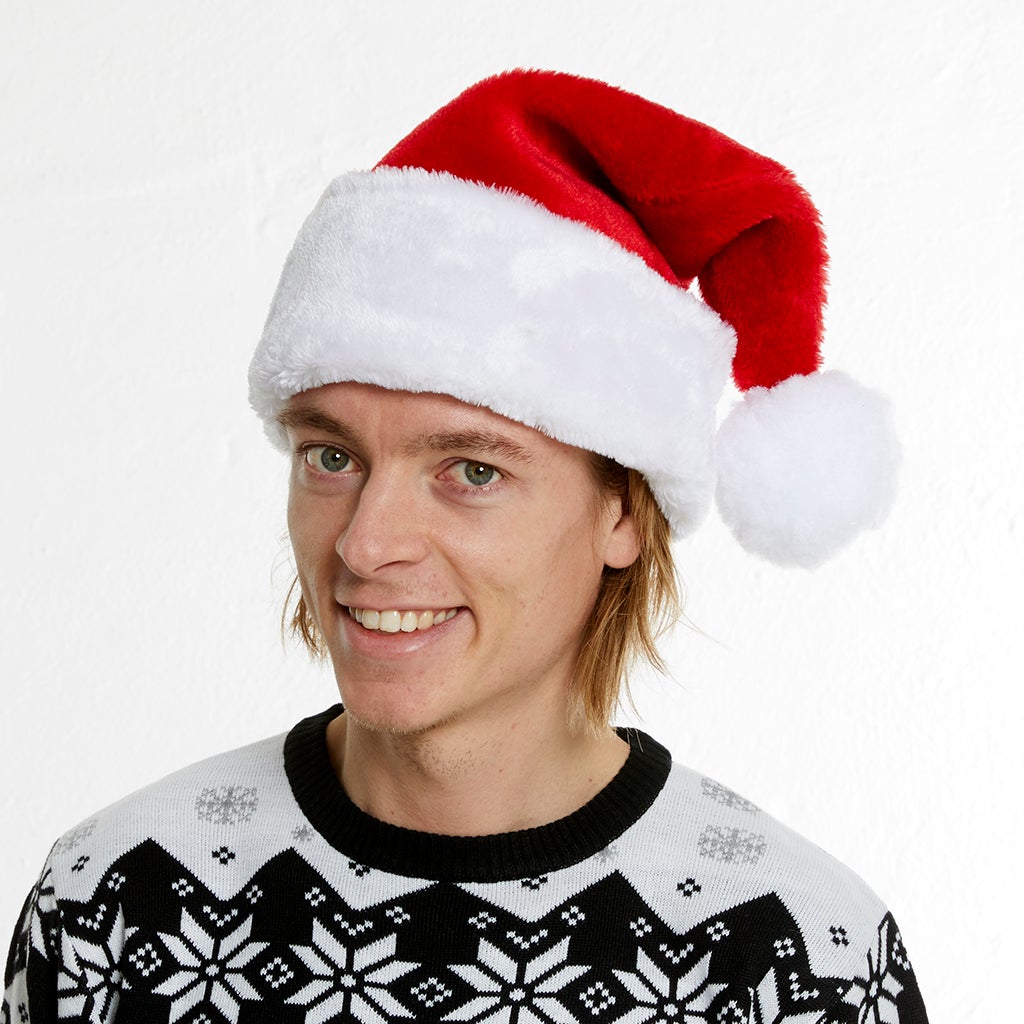 En man med tomteluva.