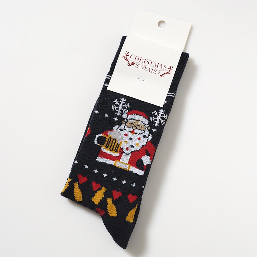 Julstrumpor med jultomten på.